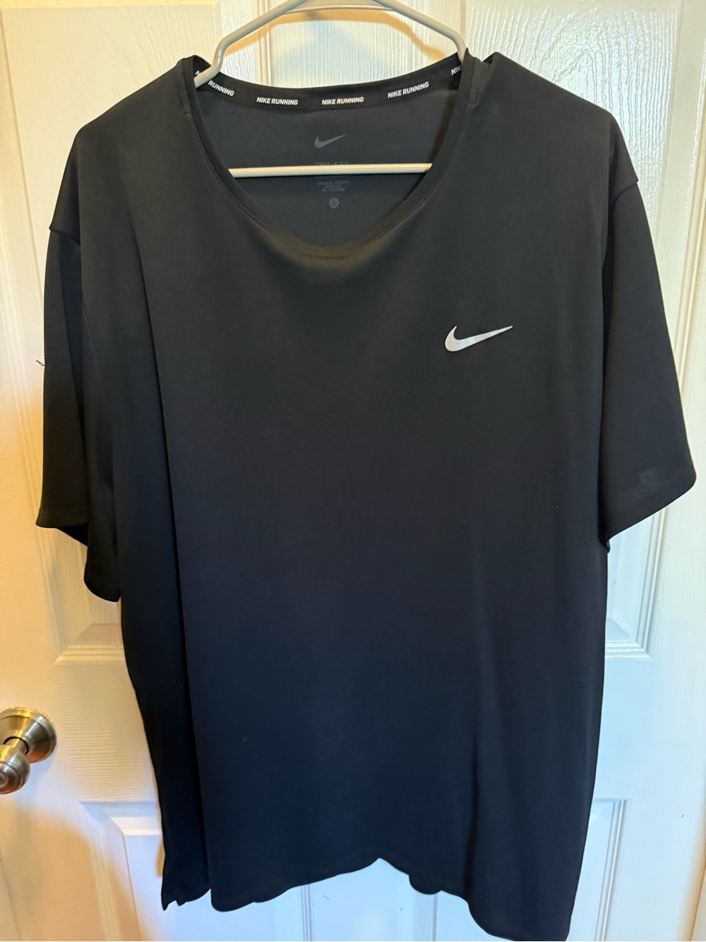 Nike Black Short-Sleeve Athletic Tee with White Swoosh